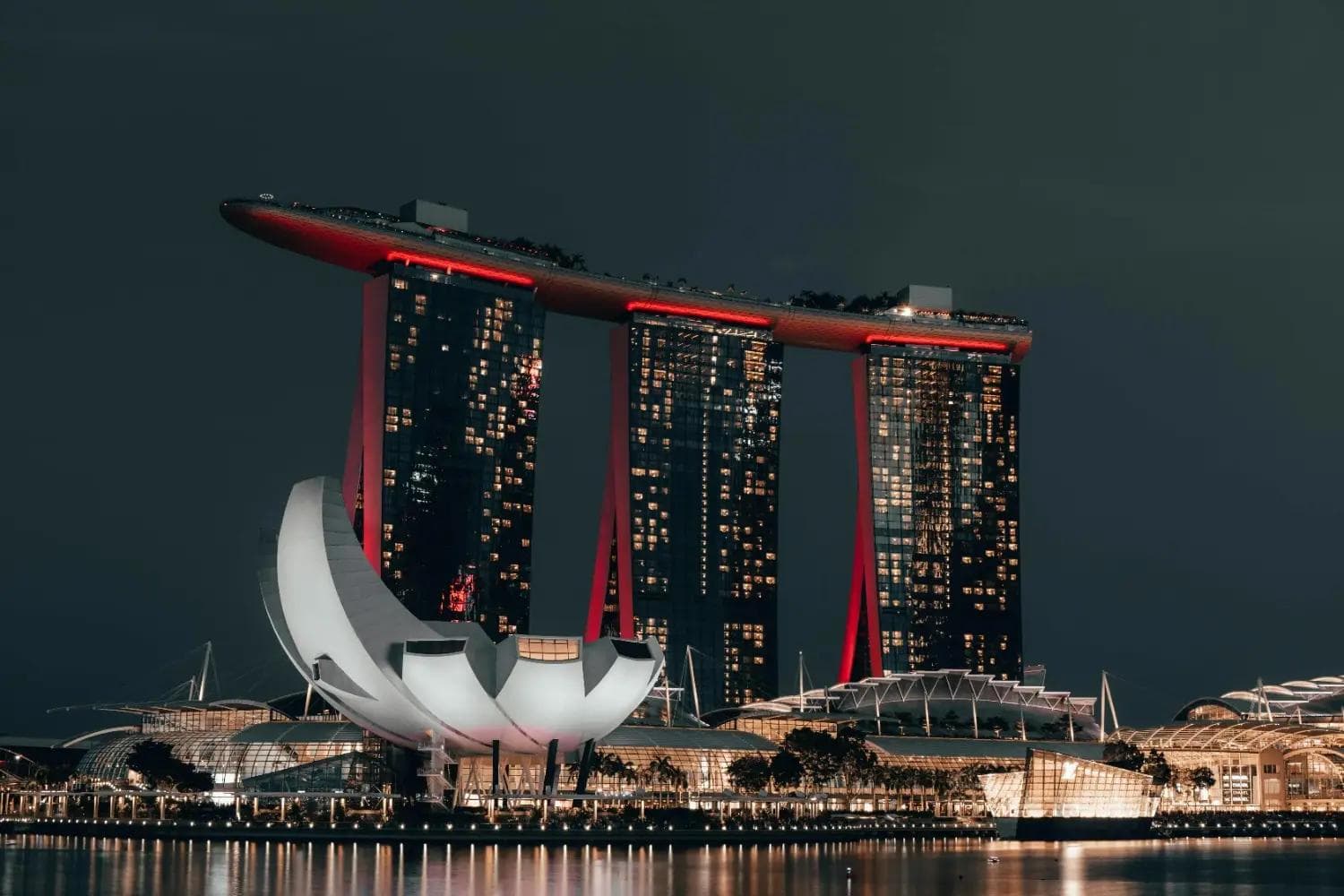 Marina Bay Sands illuminated at night — one of the most iconic places to visit in Singapore, showcasing stunning architecture and luxury skyline views
